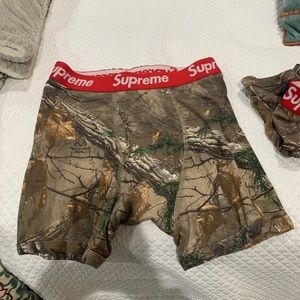 2 pairs of Supreme underwear, sticker & bag